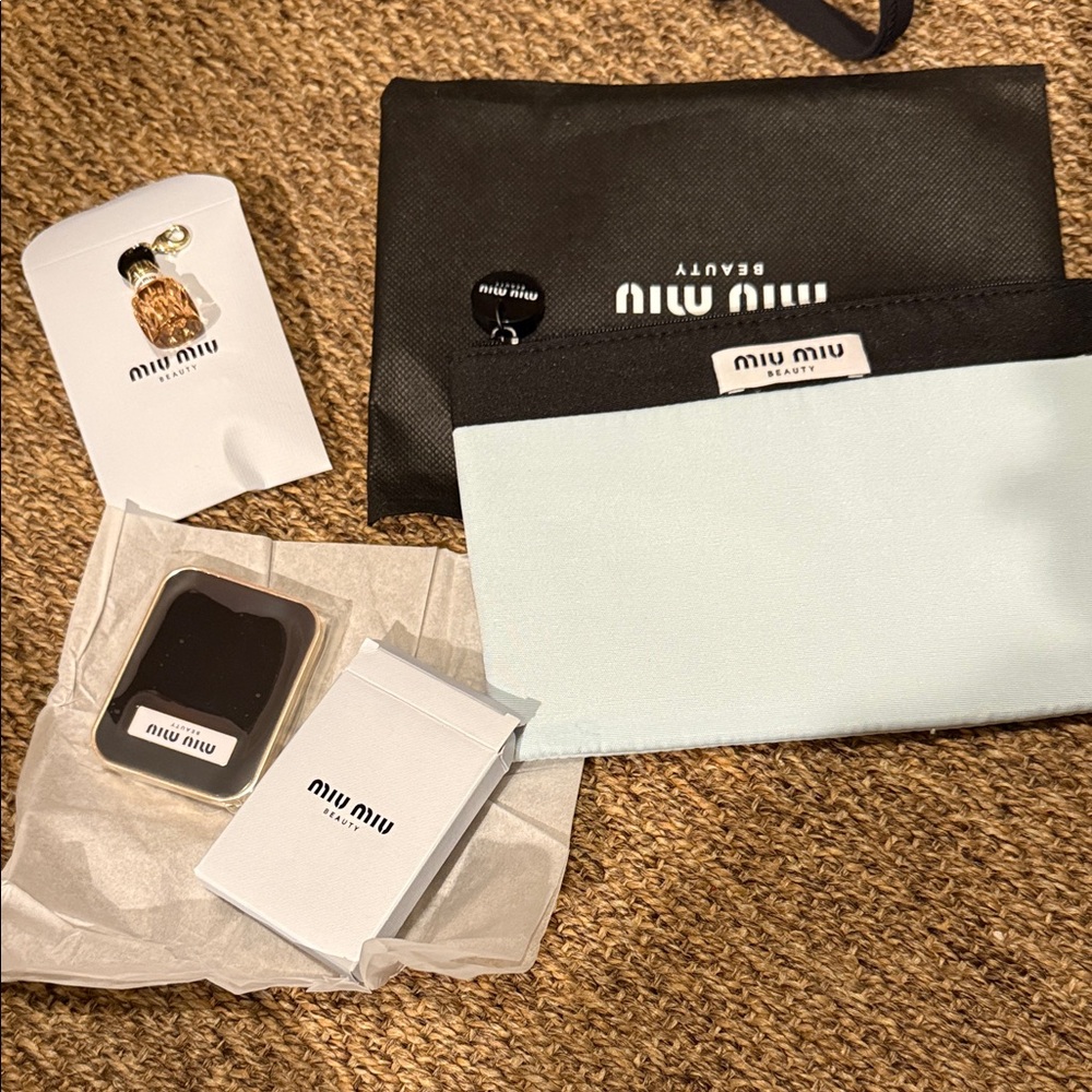 Miu Miu compact mirror , charm and makeup pouch